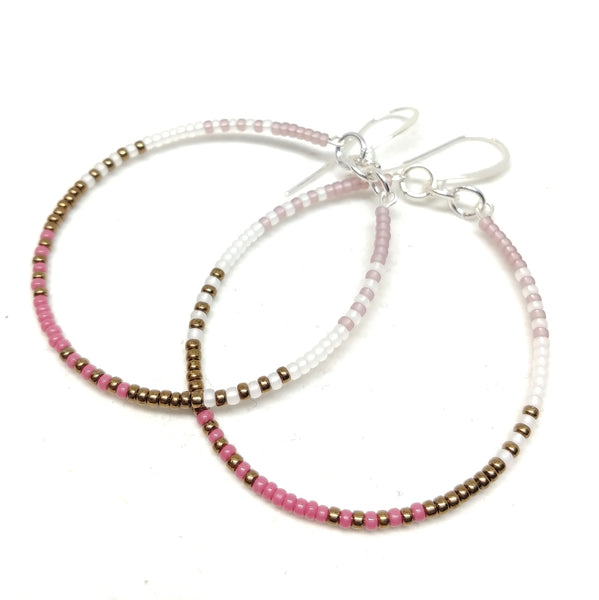 Beauty Hoops: Silver-plated beaded hoops featuring seed beads in amethyst, white, bronze and mulberry.