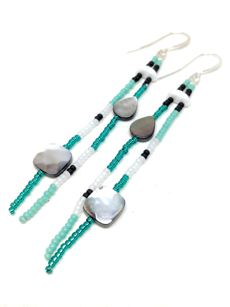 Energy dangles: silver plated, featuring black lip mother of pearl, and seed beads in turquoise, black, white and emerald.