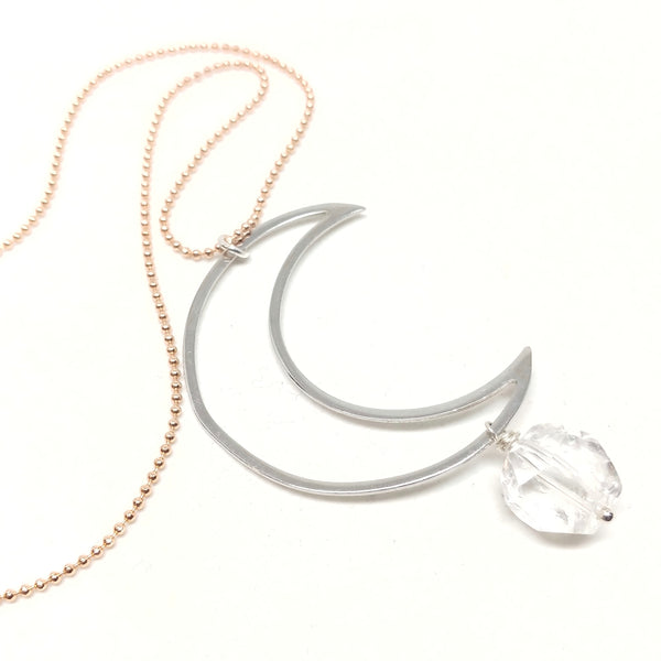 Quartz Moon Necklace featuring rose gold-plated ball chain and silver-plated crescent pendant with faceted quartz nugget.
