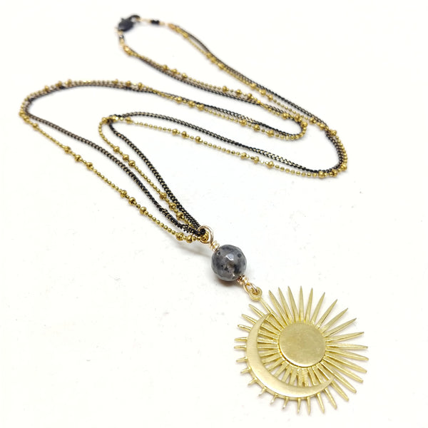 20" chain with 50mm pendant.   Double chains: black oxidized brass and brass saturn ball chain with black brass clasp.   Pendant: Larvikite bead with brass sun and moon pendant.