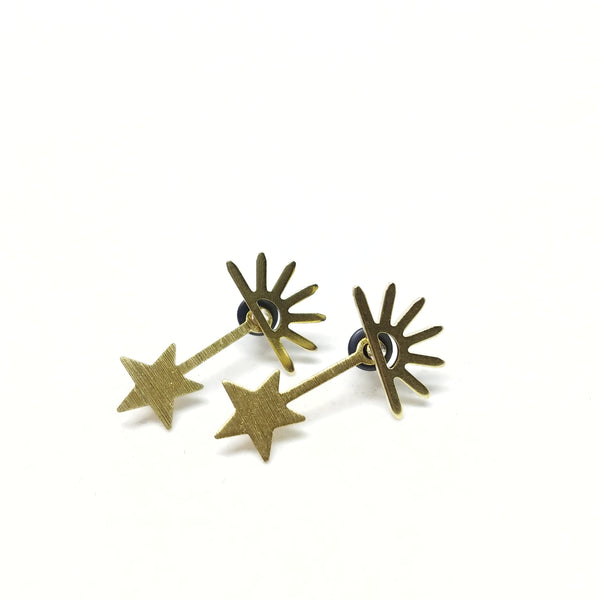 Minimalist ear jacket sunrise studs with falling star charm in raw brass.