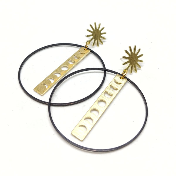 65mm Raw brass Sunburst studs with black oxidized black hoop and raw brass moon phase charm.