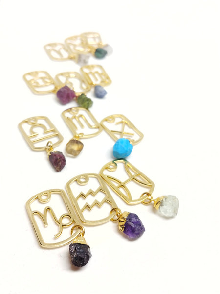 Gold Zodiac Dog Tags with raw birthstones.
