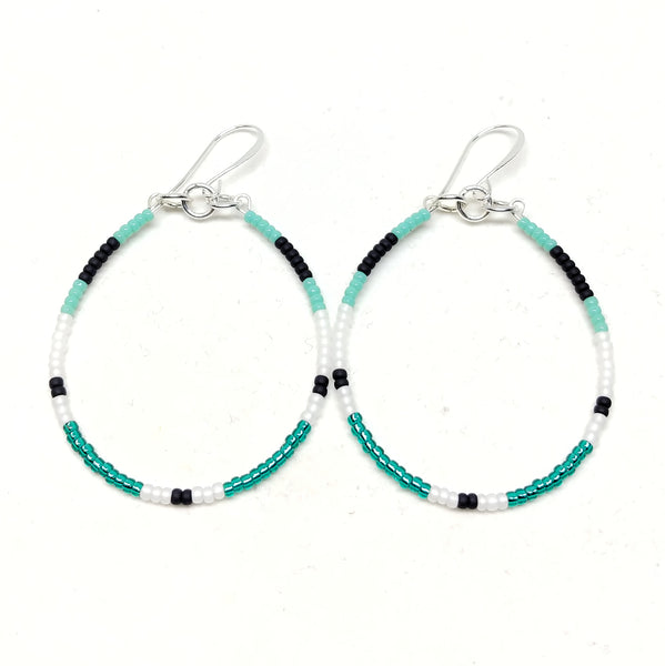 Energy Hoops: silver plated ear wires, seed beads in turquoise, black, white and emerald.