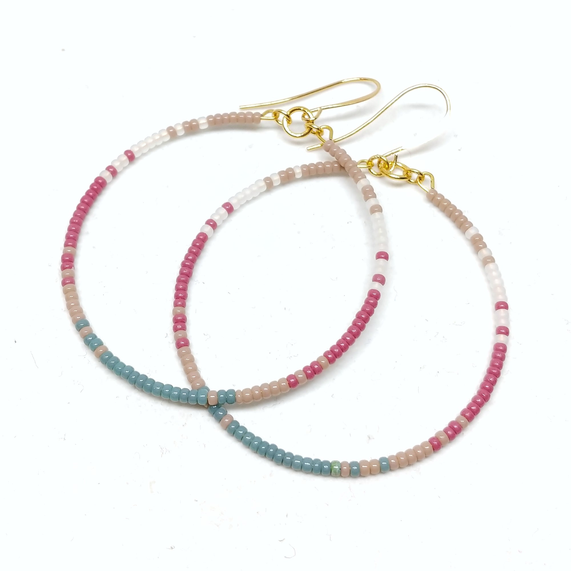 Gratitude Hoops: Gold plated ear wires and featuring seed beads in beige, white, mulberry and cyan.