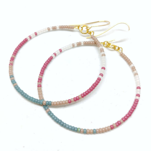 Gratitude Hoops: Gold plated ear wires and featuring seed beads in beige, white, mulberry and cyan.