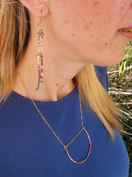 Model wearing Gratitude Dangles and Necklace