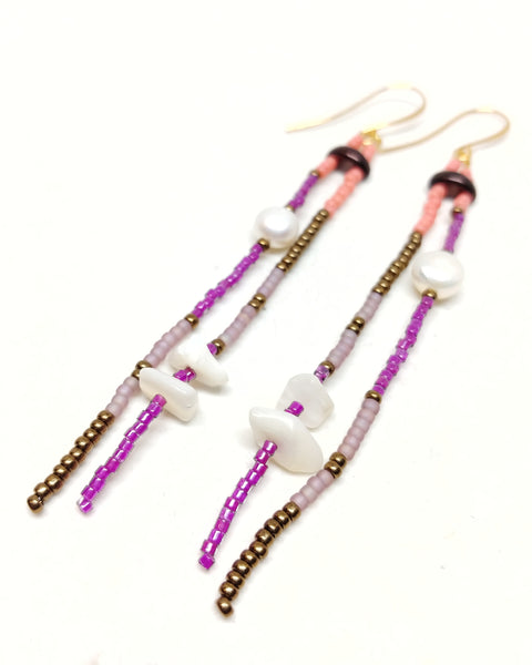 Joyful Dangles: Gold plated wire. Featuring pearls, mother of pear, and seed beads in bronze, salmon, amethyst and plum.