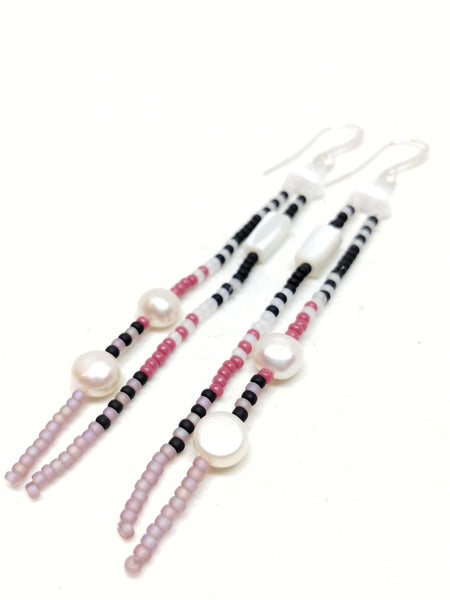 Momentum Dangles: Silver ear wires. Features pearls and mother of pearl, and seed beads in white, black, mulberry and amethyst.