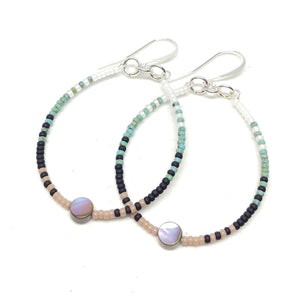 Peaceful Hoops: Silver wires, featuring abalone and seed beads in white, turquoise, black and beige.