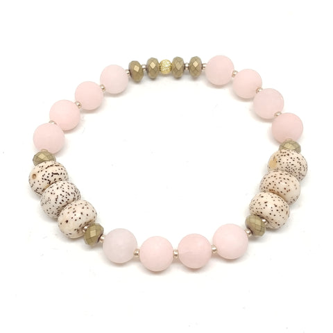 Wildflower stretch bracelet, pale peach jade (dyed), bodhi seeds, hematite, gold spacer beads.