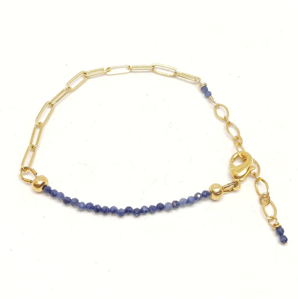 September birthstone sapphire bracelet on gold-plated paper clip chain.