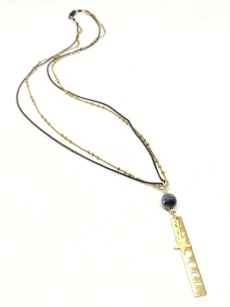 20" double chain necklace featuring delicate black brass chain and brass saturn ball chain. 60mm pendant with single larvikite bead and brass moon phase and falling star charms.