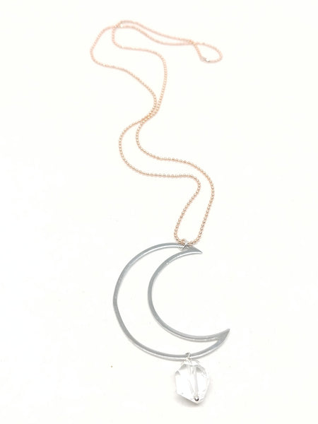 Quartz Moon Necklace featuring rose gold-plated ball chain and silver-plated crescent pendant with faceted quartz nugget. 22"
