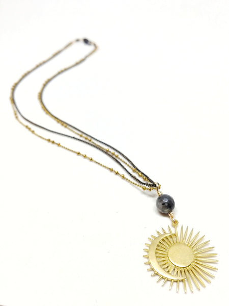 20" chain with 50mm pendant.   Double chains: black oxidized brass and brass saturn ball chain with black brass clasp.   Pendant: Larvikite bead with brass sun and moon pendant.