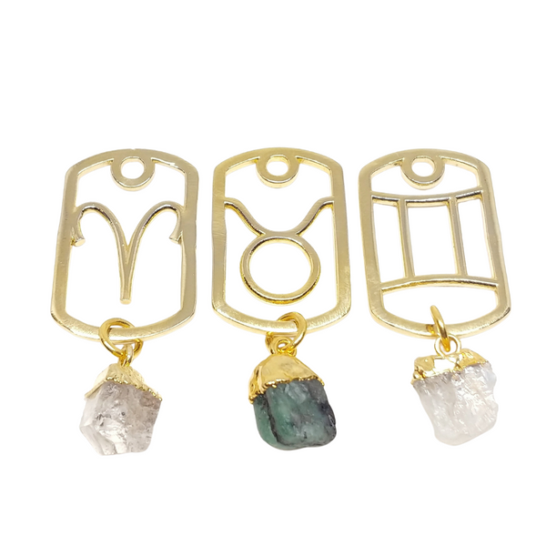 Gold Zodiac Dog Tags with raw birthstones: Aries & Herkimer Diamond, Taurus & Emerald, Gemini & Moonstone.